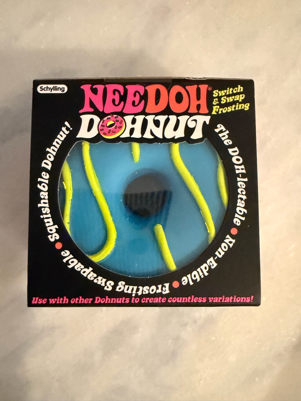 AUTHENTIC Schylling NeeDoh Donut Blue Squishable Toy with Yellow Frosting